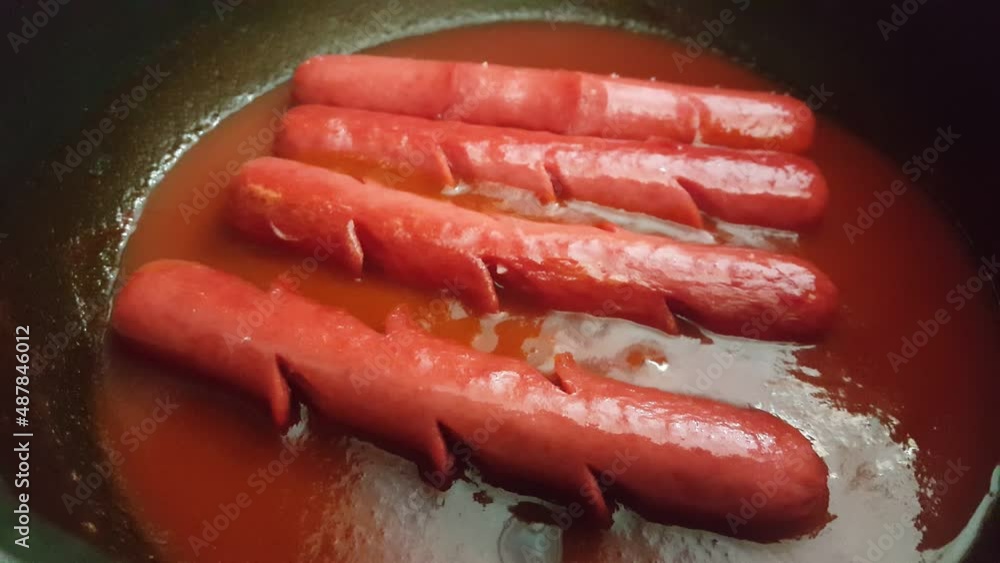 Video image of homemade hot dogs in the pot Video image of homemade hot dogs in the pot
