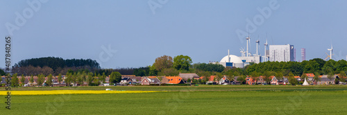 Panoramic view of village and nuclear power plant Borssele in Zeeland in The Netherlands photo