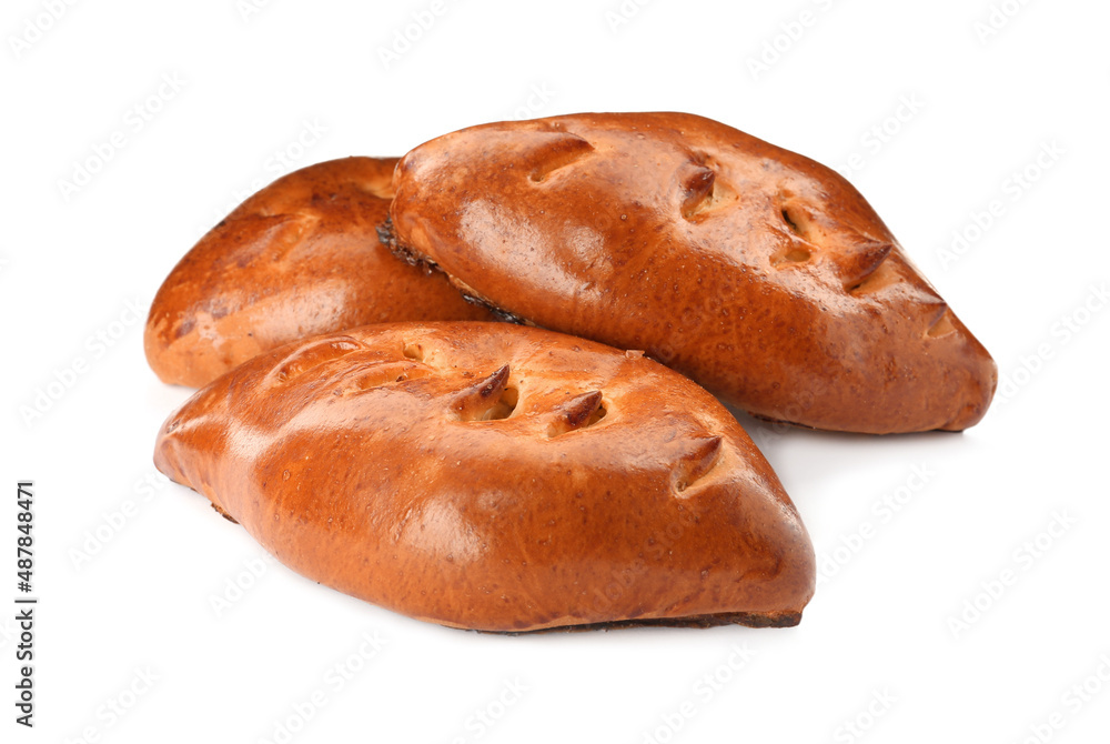 Many delicious baked patties on white background Many delicious baked patties on white background