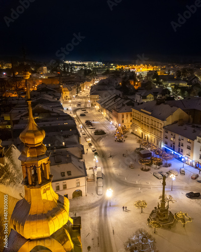 The illuminated cityscape at night in winter in Svitavy town, Czech Republic photo