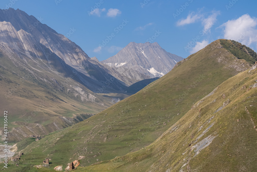 A view on the sharp ridges in Ossetia from the Truso Valley near the Ketrisi Village Kazbegi District, Mtskheta in the Greater Caucasus Mountains, Georgia. Russian Border. Trekking, Wanderlust.