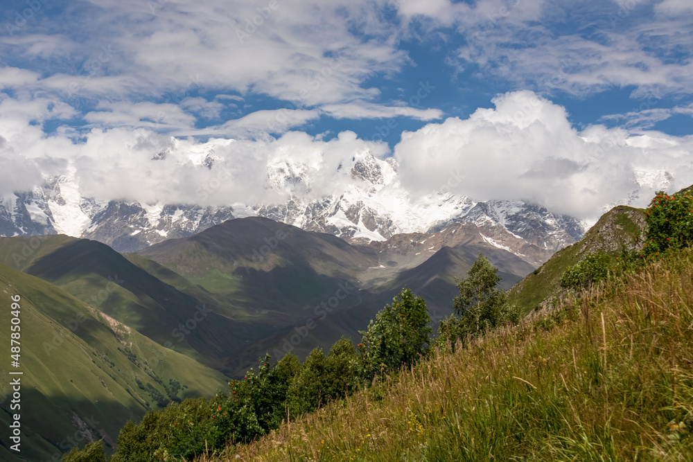 A hiking trail leading to Chubedishi viewpoint. There is an amazing view on the Shkhara Glacier,near the village Ushguli the Greater Caucasus Mountain Range in Georgia, Svaneti Region. Pasture, Meadow