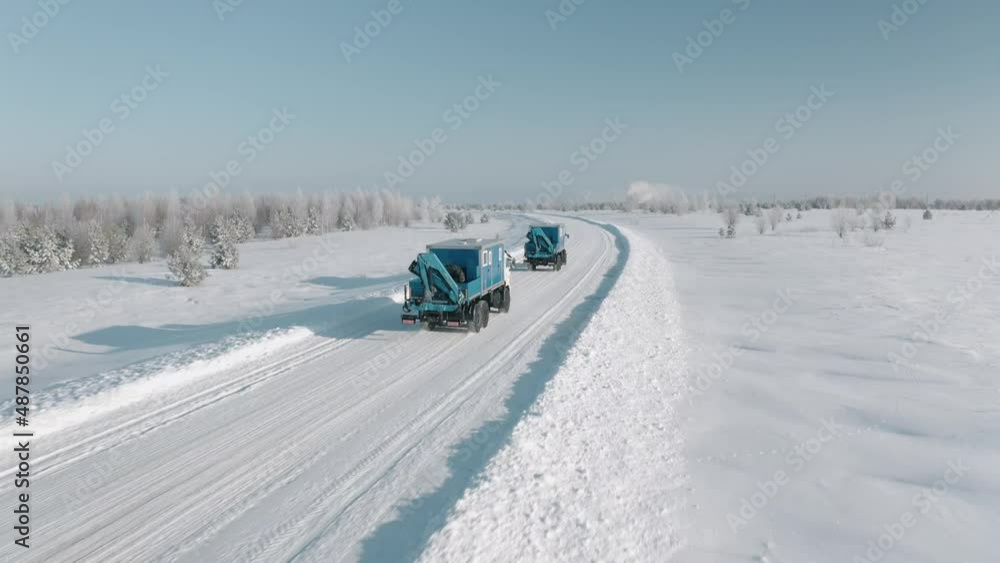 a Specialized car of the emergency utility service in the winter road.