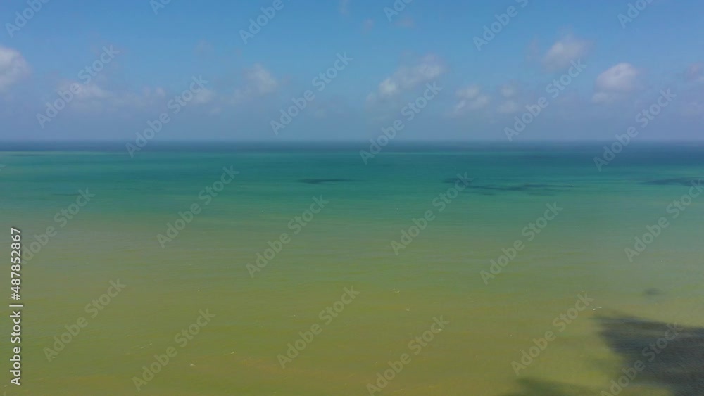 Open blue ocean with waves against the sky and clouds. Ocean skyline. Open blue ocean with waves against the sky and clouds. Ocean skyline.