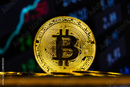 Bitcoin BTC with stock market statistics chart background. Crypto currency growth in world e-commerce system financial concept