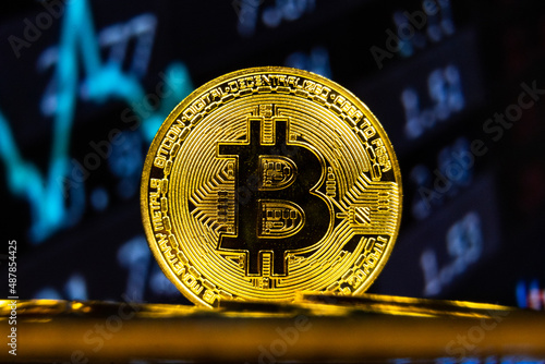 Bitcoin BTC with stock market line chart. Crypto currency growth in world trade system concept