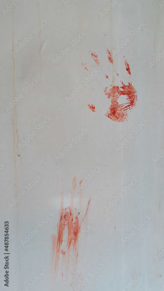 bloody handprints on a white wall. crime concept Stock Photo | Adobe Stock