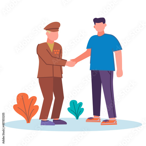 a young guy a patriot volunteer shakes hands with a war veteran