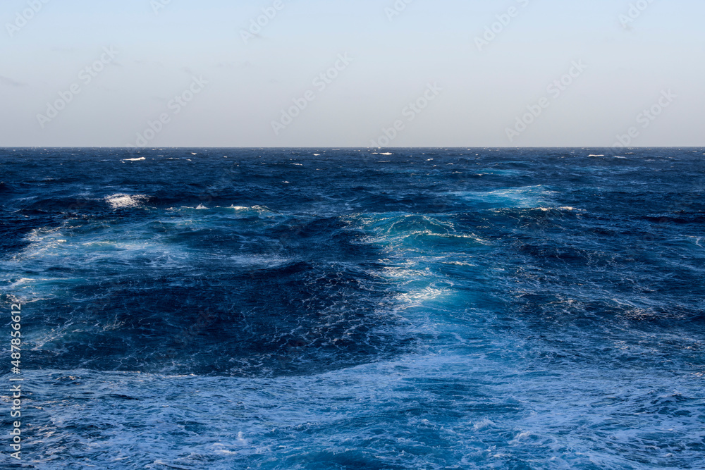 Beautiful seascape - waves and sky with clouds with beautiful lighting. Caribbean sea. Mediterranean sea.