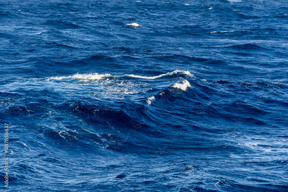 Fototapeta premium Beautiful seascape - waves and sky with clouds with beautiful lighting. Caribbean sea. Mediterranean sea.