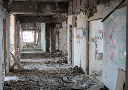 war. building after the bombing. destroyed building. old abandoned building. Old stairs of an abandoned house. old room interior