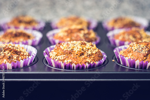 Delicious cupcakes with babanas and walnuts. photo