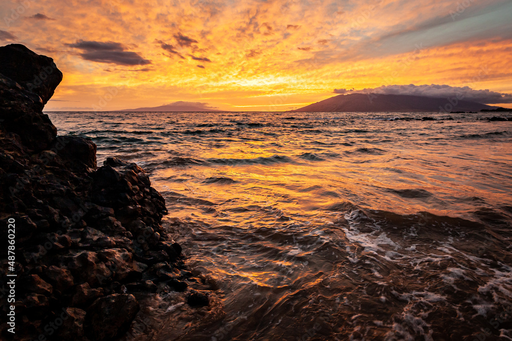 Stunning sunset over the Pacific Ocean in Maui, Hawaii
