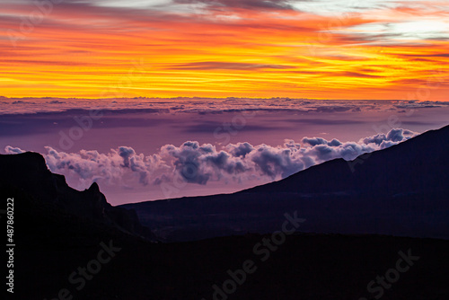 Stunning sunrise at Haleakala National Park summit over volcanic craters