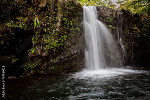 Stunning waterfall along the Road to Hana in Maui.