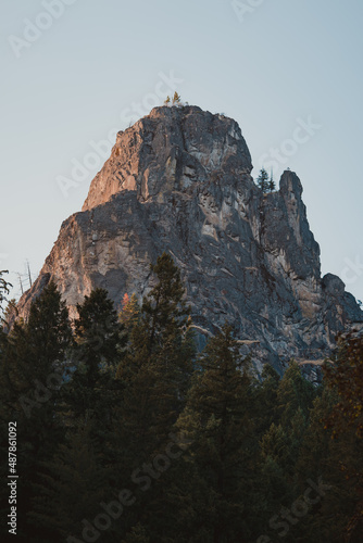 Sun setting on a rocky peak in the mountains of Oregon