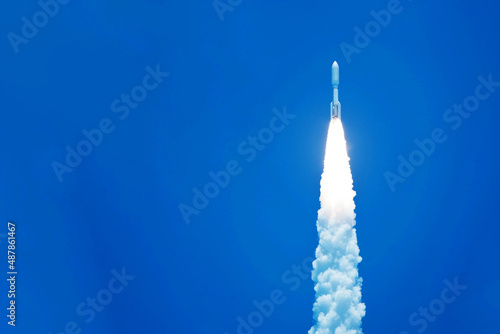 Fototapeta Naklejka Na Ścianę i Meble -  Take off space rocket on a background of blue sky and sun. Elements of this image were furnished by NASA