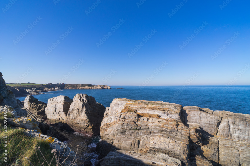 Coastal landscape with rocks and sea. Copy space.