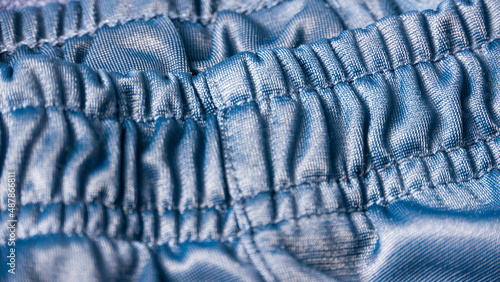Fotografie Cintura elástica de pantalón deportivo azul