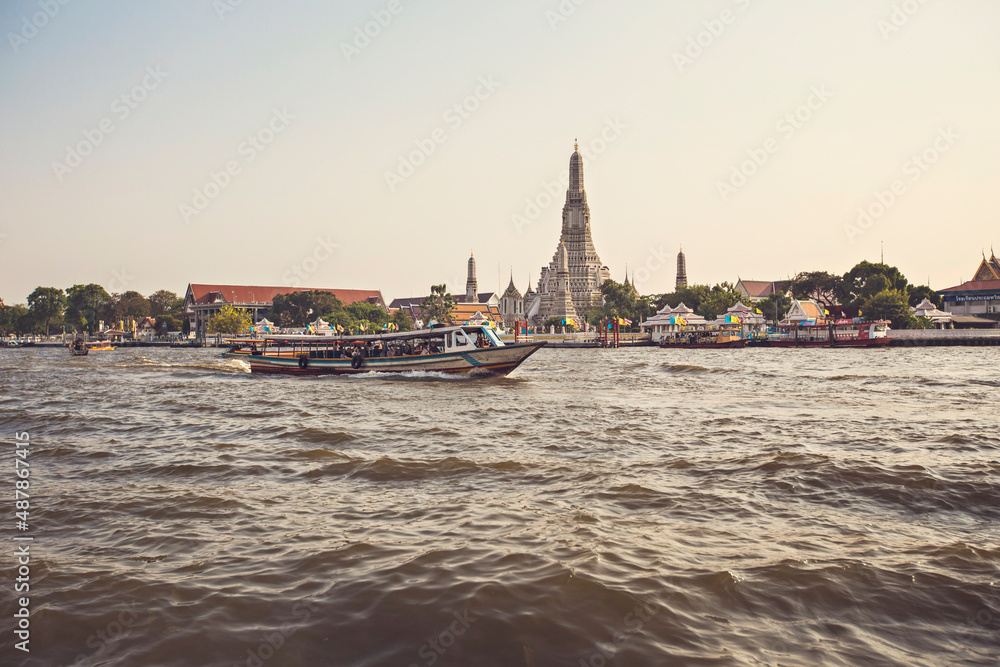 Longtail boat on the Chao Praya river near Wat Arun, Bangkok, Thailand