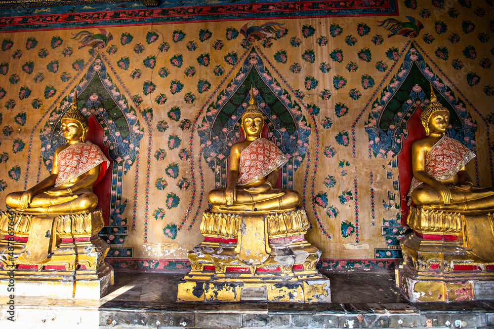 Golden Buddha statues in Wat Arun temple, Bangkok, Thailand