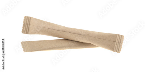 Sugar stick. Sugar in paper kraft packaging. Mock up for design isolated on white background