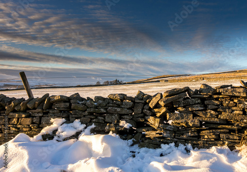A mackerel sky over a snowy landscape in Weardale, the North Pennines, County Durham, UK