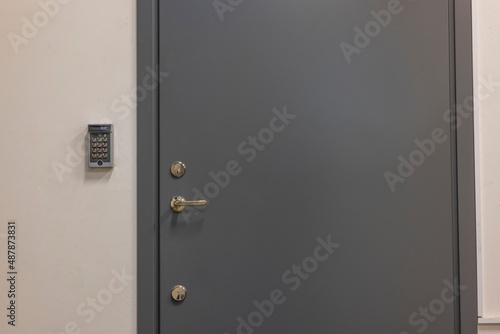 Canvastavla Close up view of a gray extra heavy metal door with an electronic combination lock