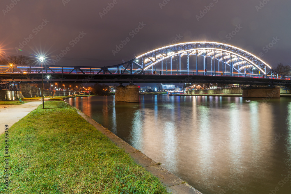 Jozef Pilsudski Bridge in the city of Krakow, Lesser Poland. Jozef Pilsudski Bridge in the city of Krakow, Lesser Poland.