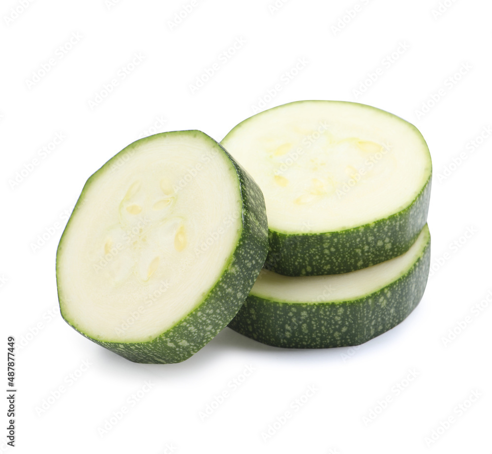 Cut green ripe zucchini isolated on white Cut green ripe zucchini isolated on white