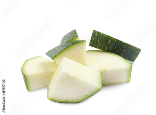 Cut green ripe zucchini isolated on white