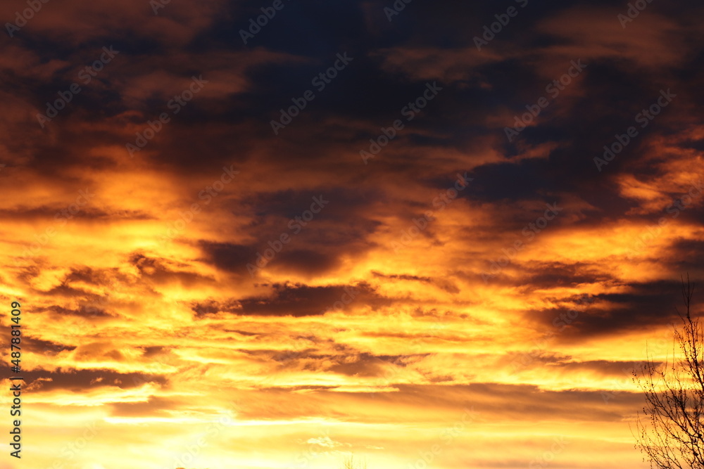 Fototapeta premium Brilliant golden clouds at sunset