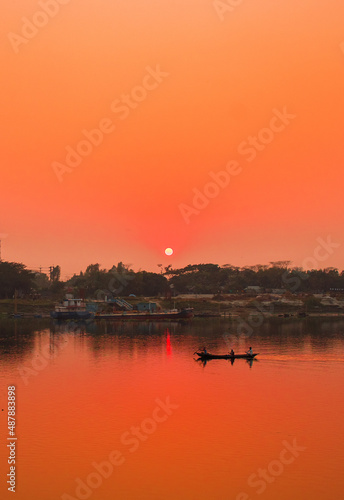 Sunset photography on the river in winter 2022. This image was taken by me on January 17, 2022, from the Doleswori river, Bangladesh, South Asia. © nhimage24