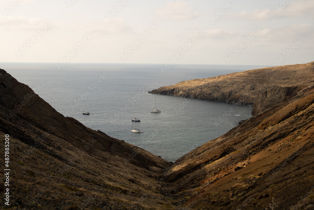 cliffs with boats 