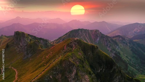 Sunser over pre alps mountains germany nature landscapes rotwand alps mountains aerial drone view.