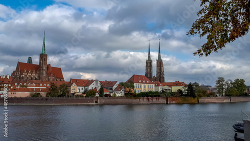 Photography A view of the city Wroclaw with historic buildings under the cloudy sky of Wrocl