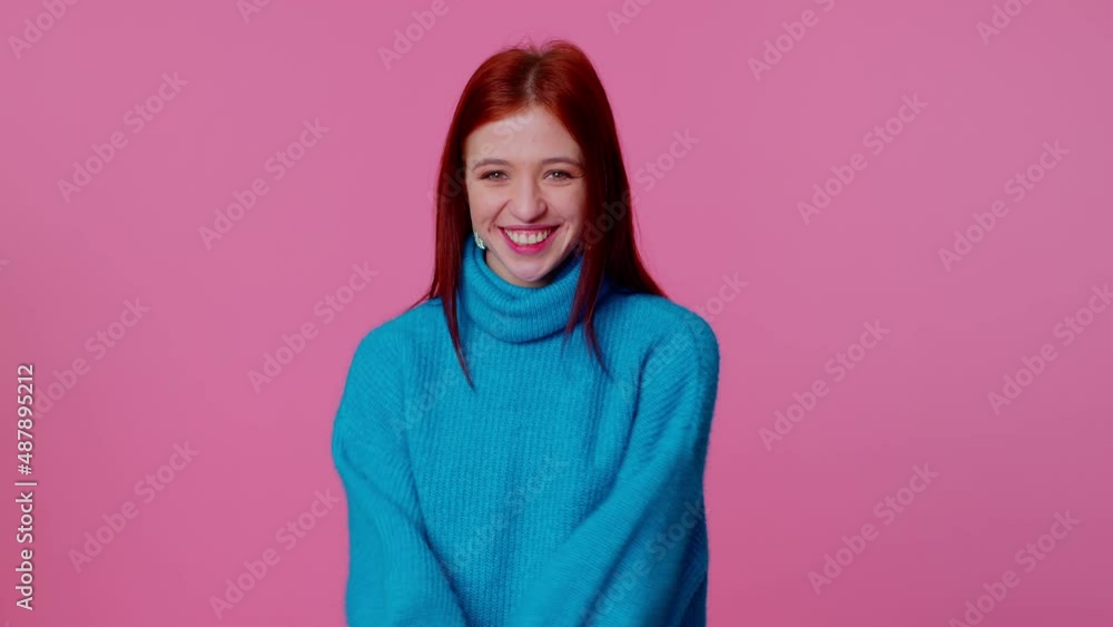 Wow. Hello, welcome. Portrait of happy excited young teenager girl appear from below waving hi with her palm, greeting with hospitable friendly smile. Indoor studio shot isolated on pink background Wow. Hello, welcome. Portrait of happy excited young teenager girl appear from below waving hi with her palm, greeting with hospitable friendly smile. Indoor studio shot isolated on pink background