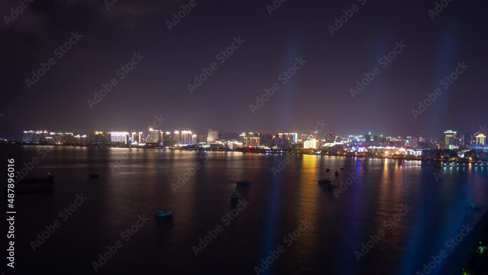 night time illuminated sanya city bay hotel rooftop panorama timelapse 4k hainan island china night time illuminated sanya city bay hotel rooftop panorama timelapse 4k hainan island china