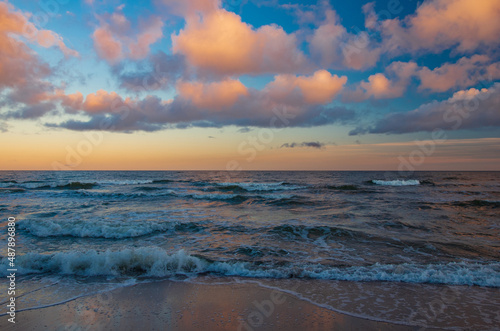 Sunrise Baltic Sea Mielno with colorful storm clouds © zmarcin