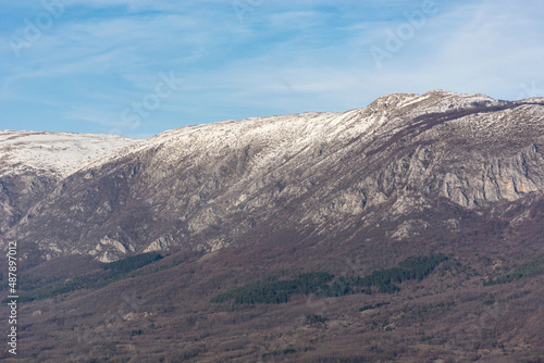 Landscape view of Suva Planina in Serbia on a winter day. The top of mountain is covered with snow