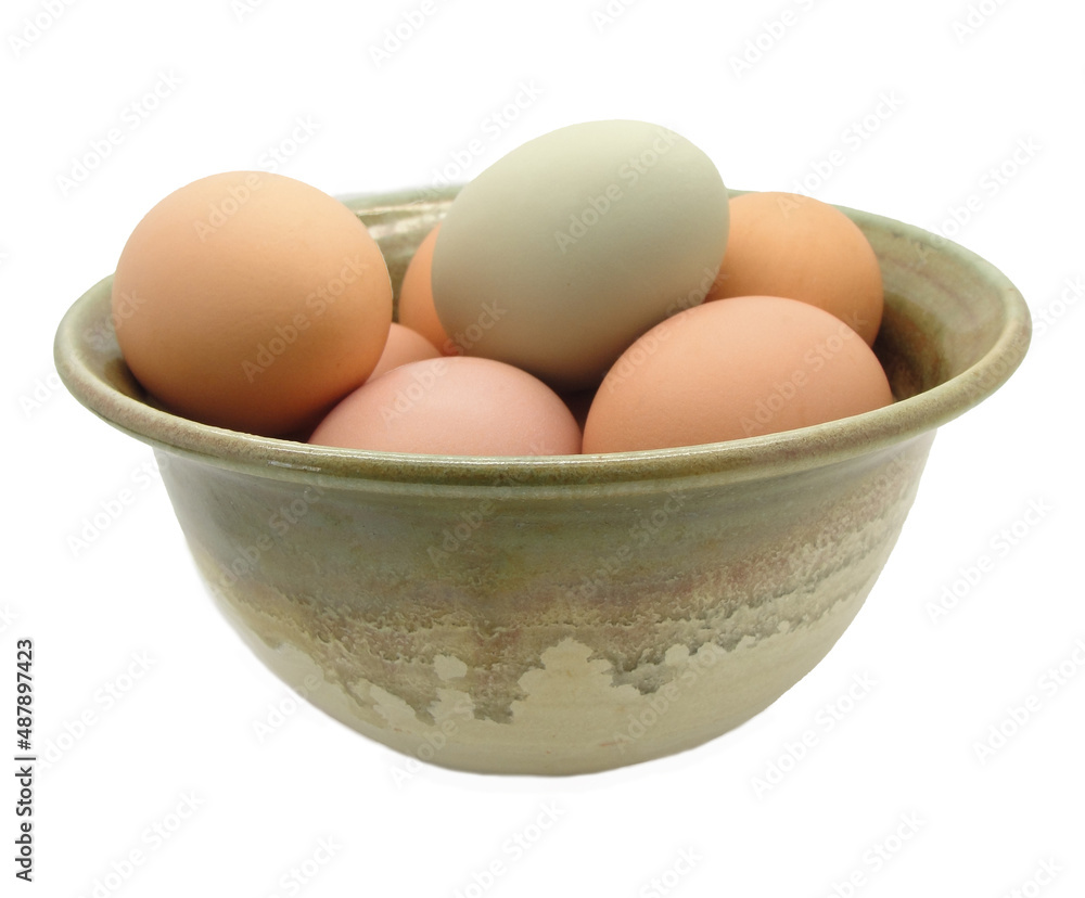 Home Raised Chicken Eggs in Green and Brown Pottery Bowl Home Raised Chicken Eggs in Green and Brown Pottery Bowl