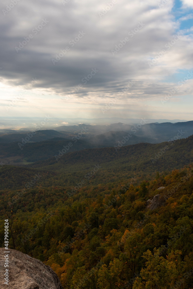 Sun Rays Shining Through the Clouds on a Overcast Fall Day in Virginia Old Rag Mountain