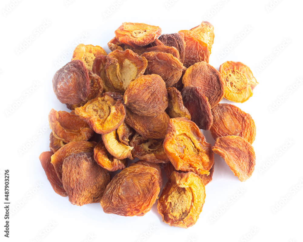 Dried Apricots in Heap or Pile Isolated on White in Top Down or Flat Lay Shot Dried Apricots in Heap or Pile Isolated on White in Top Down or Flat Lay Shot