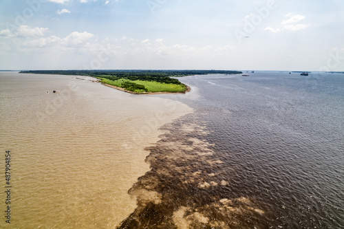 Amazon and Rio Negro, Manaus city, Brazil photo
