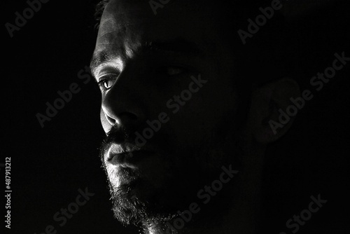 Portrait of sad man looking photo