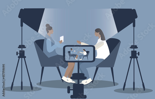 vector hand drawn illustration in flat style on the theme of blogging, creating video content, interviews. Two women are recording a joint video.