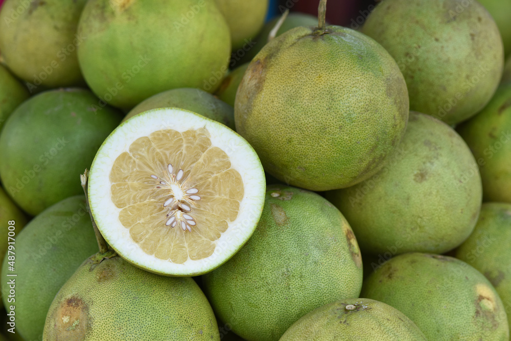Close-up photo of pomelos in market. The pomelo is commonly consumed and used for festive occasions throughout Southeast Asia.Chinese and Taiwanese will eat pomelo on Mid-Autumn Festival. Close-up photo of pomelos in market. The pomelo is commonly consumed and used for festive occasions throughout Southeast Asia.Chinese and Taiwanese will eat pomelo on Mid-Autumn Festival.