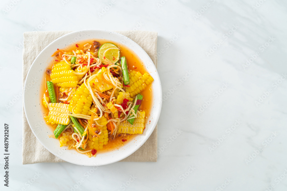 Som Tum - Thai spicy papaya salad with corn Som Tum - Thai spicy papaya salad with corn