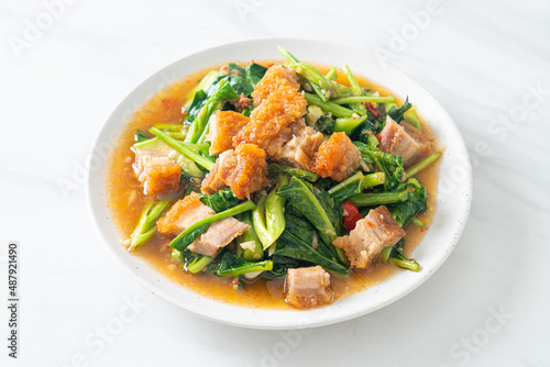 Stir-fried kale vegetable with crispy pork