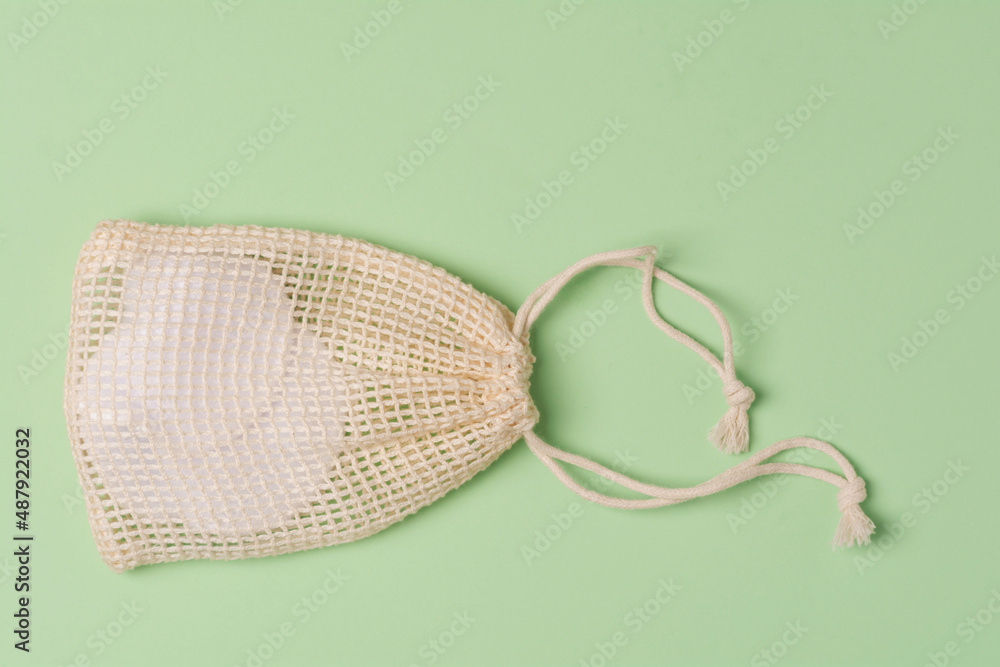 Reusable sponges in natural fiber pouch. Eco friendly accessories. Zero waste Reusable sponges in natural fiber pouch. Eco friendly accessories. Zero waste
